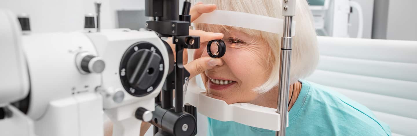Woman having her eyes examined.